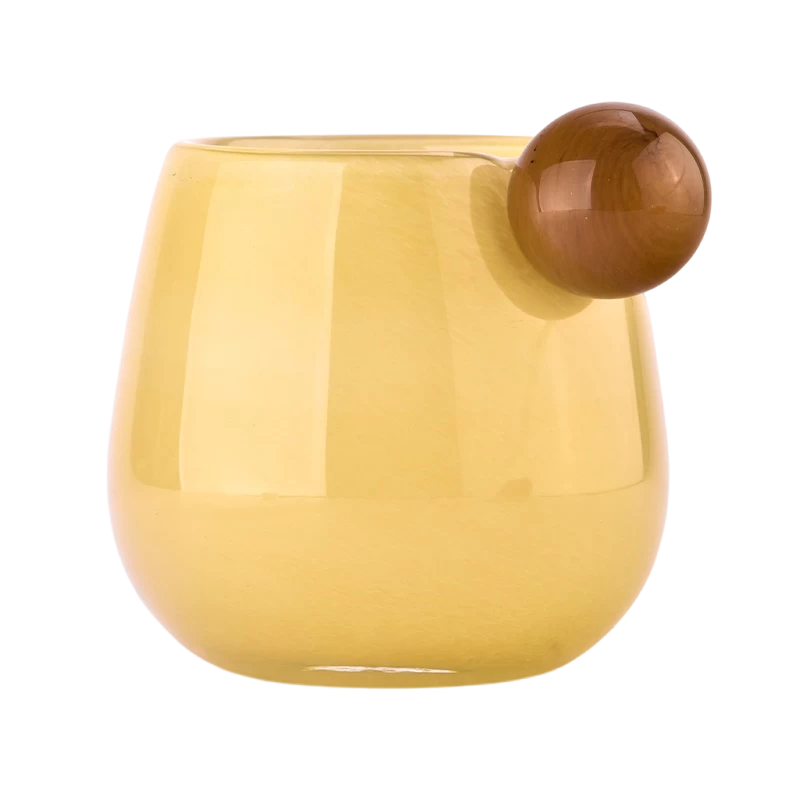 China Wholesale yellow glass candle holder with ball handle candle containers manufacturer
