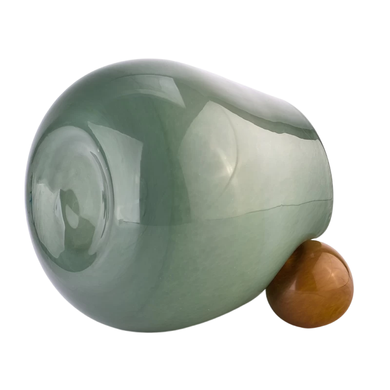 China Newly designed home decor green glass candle holder with ball handle manufacturer