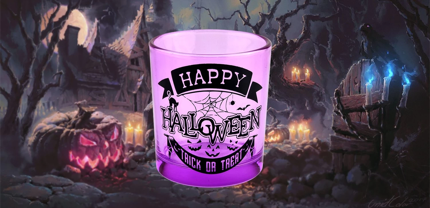 Halloween holiday decoration purple glass candle jar black lettering graffiti used for candle making