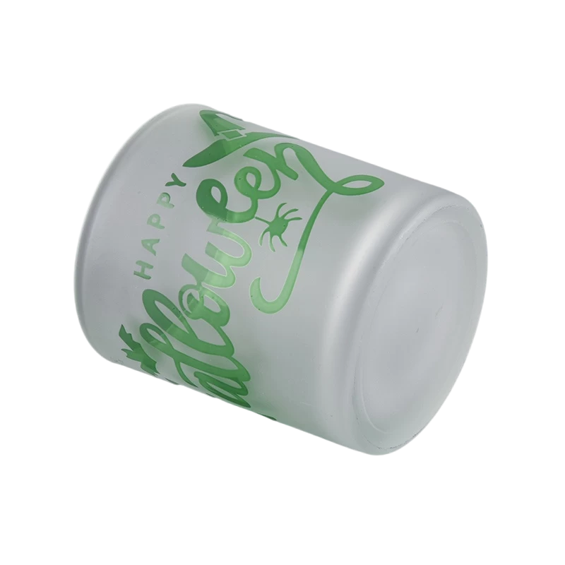 China Wholesale white frosted green graffiti Halloween glass candle jars for party event decorations manufacturer