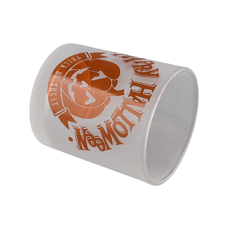 China Wholesale frosted pumpkin Halloween pattern glass candle jars manufacturer