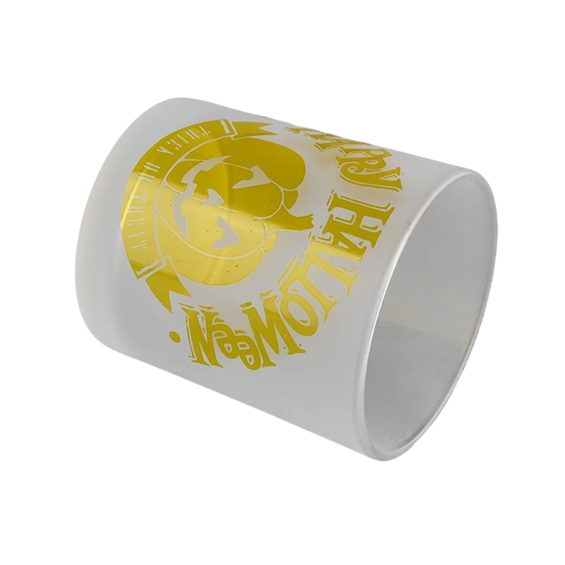 China Custom frosted yellow pumpkin Halloween pattern glass candle jar candle holder decoration manufacturer
