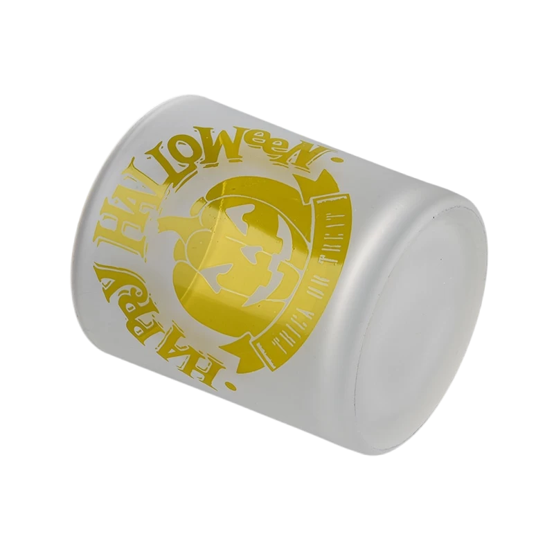 China Custom frosted yellow pumpkin Halloween pattern glass candle jar candle holder decoration manufacturer