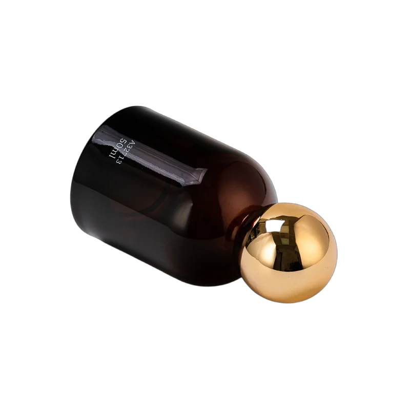 China Wholesale gilded spherical lid amber-brown perfume bottles manufacturer