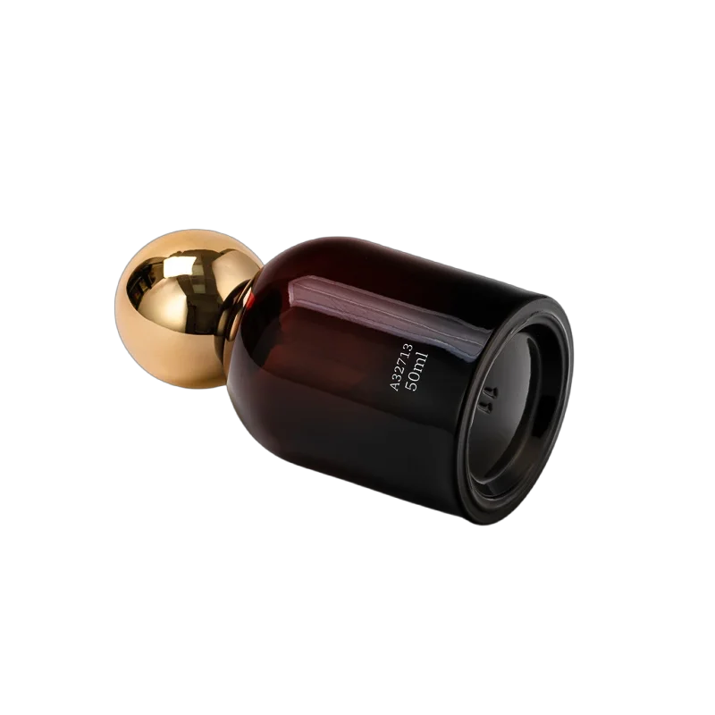China Wholesale gilded spherical lid amber-brown perfume bottles manufacturer