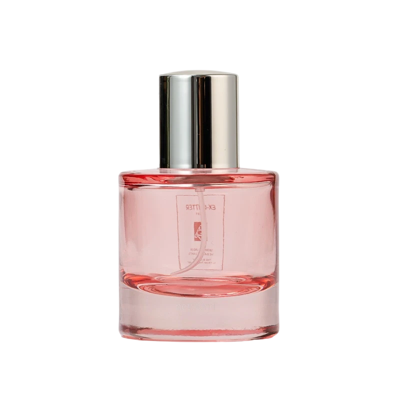 China Luxury custom-made pink translucent gradient round bottle perfume bottle manufacturer
