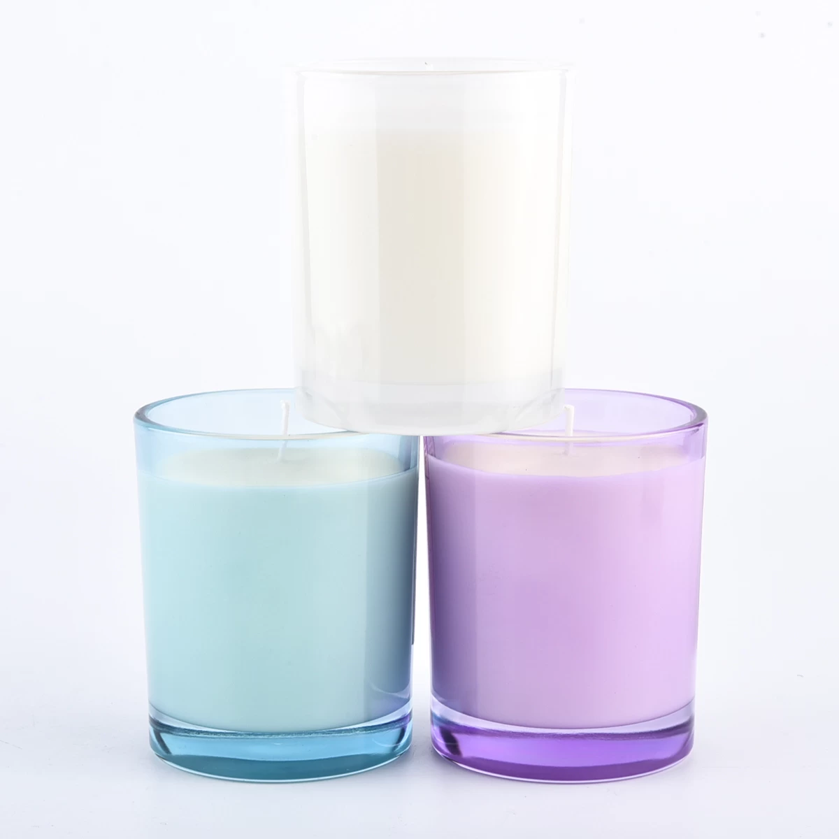 transparent colored glass candle vessels with thick bottom