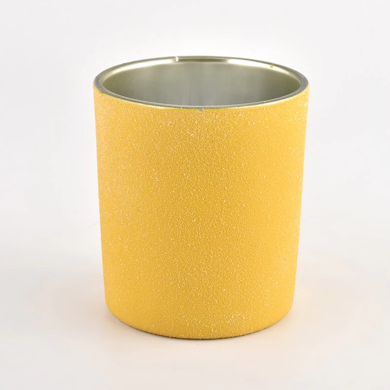 yellow sandy finish glass candle holder with metallic silver inside