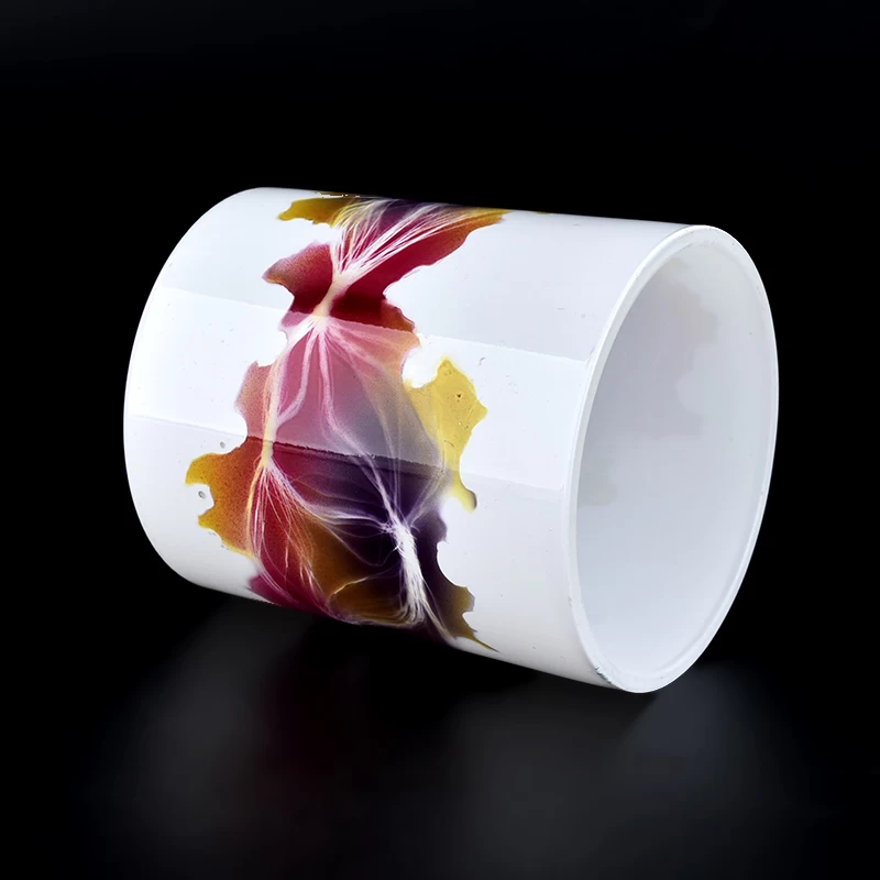 white glass candle holder with colorful print