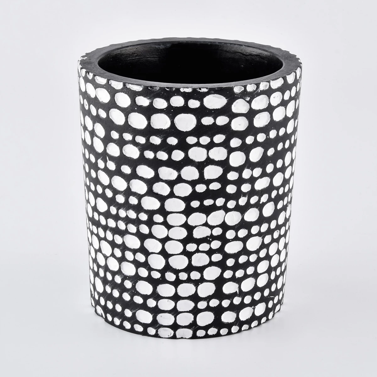 white cement candle container with white patterns, decorative candle jars