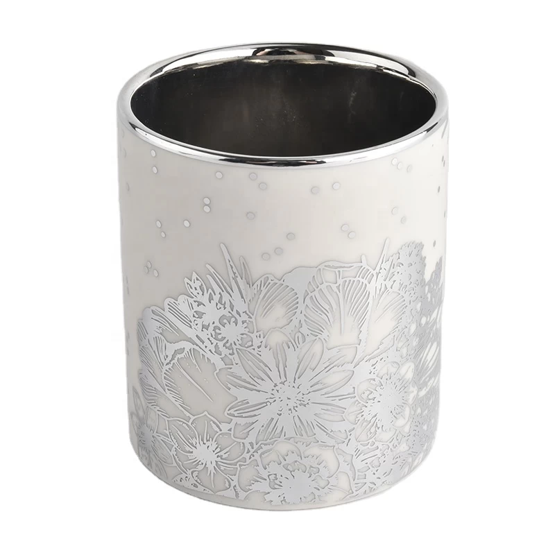 white ceramic candle jars with silver flowers printing