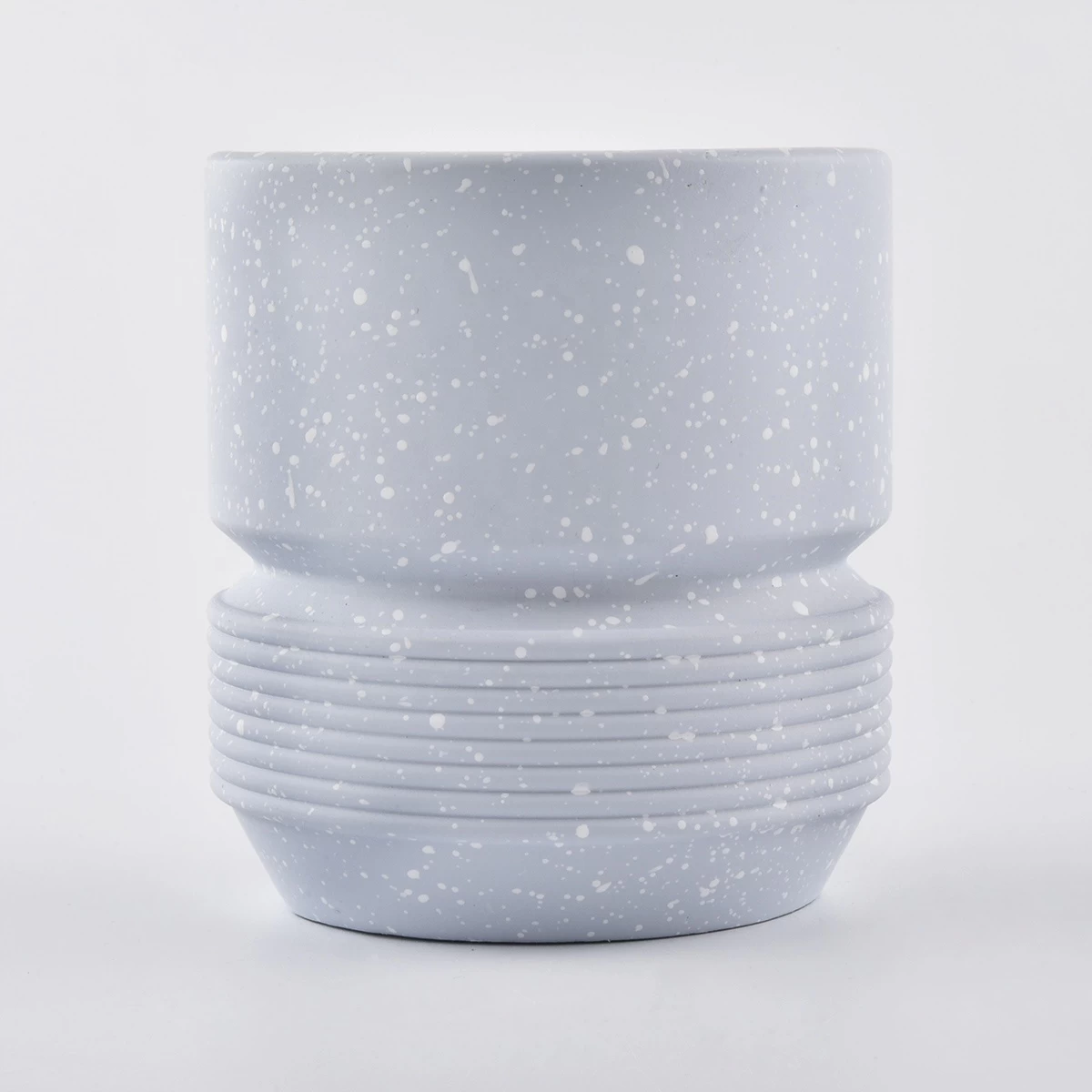 light blue concrete candle jars with white spots