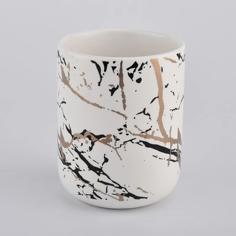 matt white ceramic candle jars with artwork