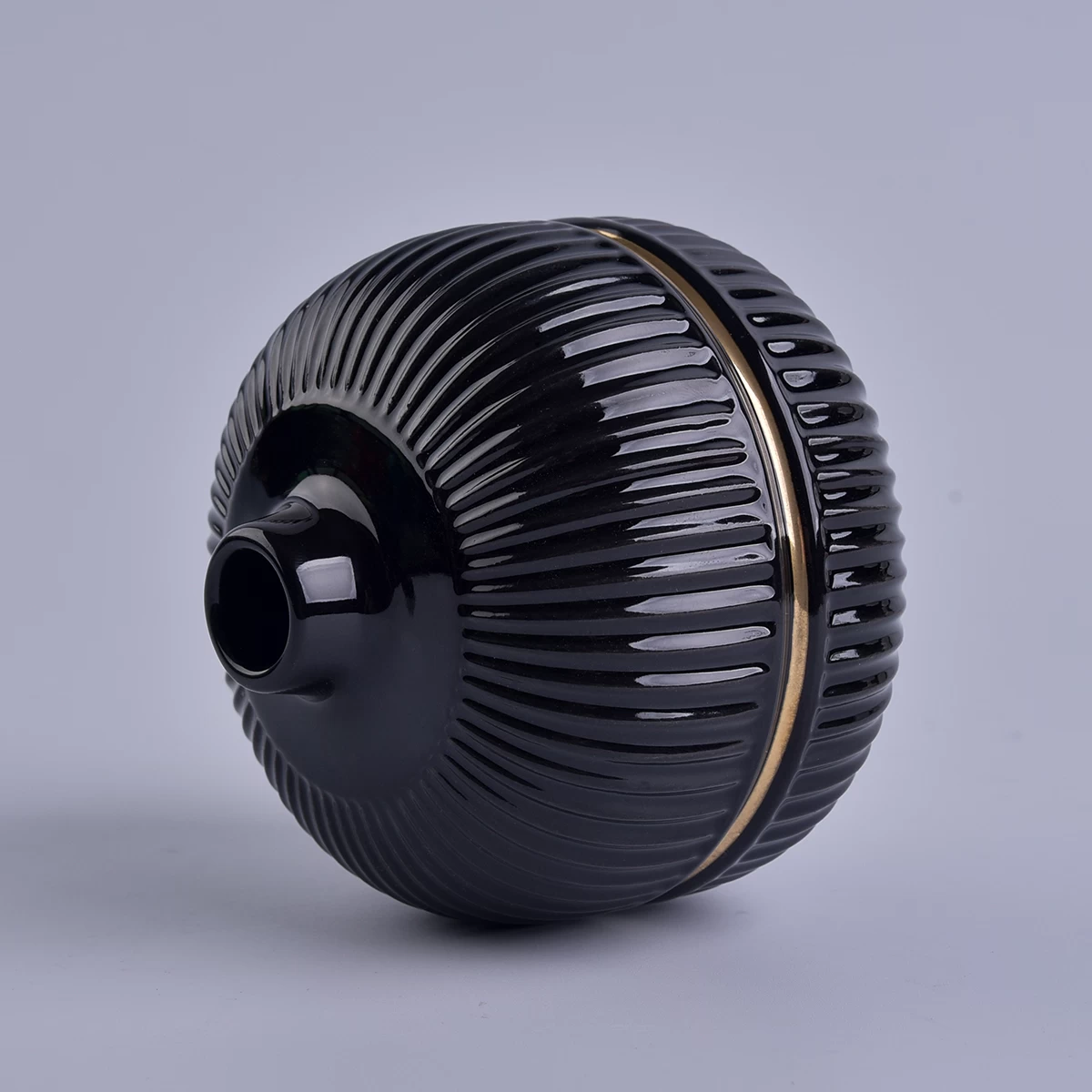 glossy black round ceramic bottle with gold ring, ceramic diffuser bottles for home