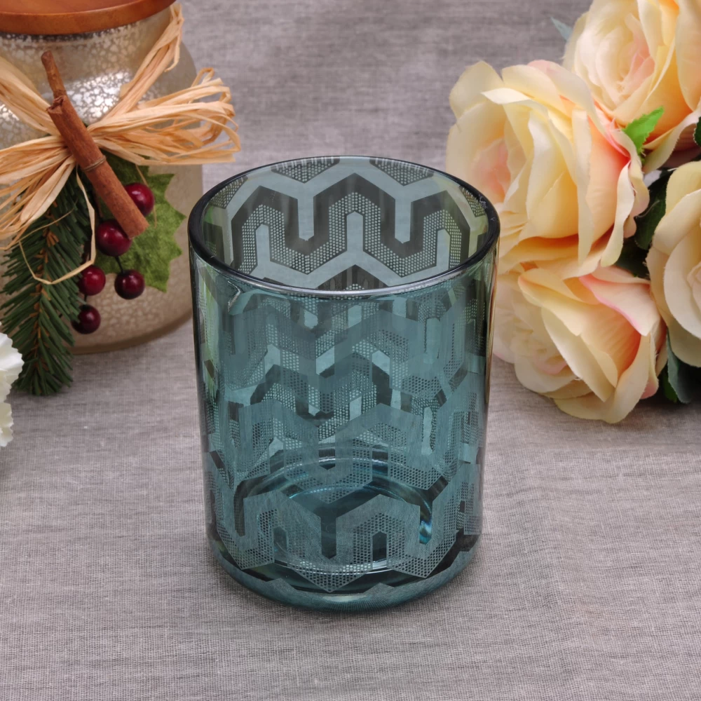 green glass candle vessel with custom lasering patterns, shiny glass jar for holidays