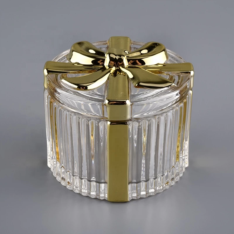 gold colored glass empty container with  glass lid,  gift box shaped glass jar