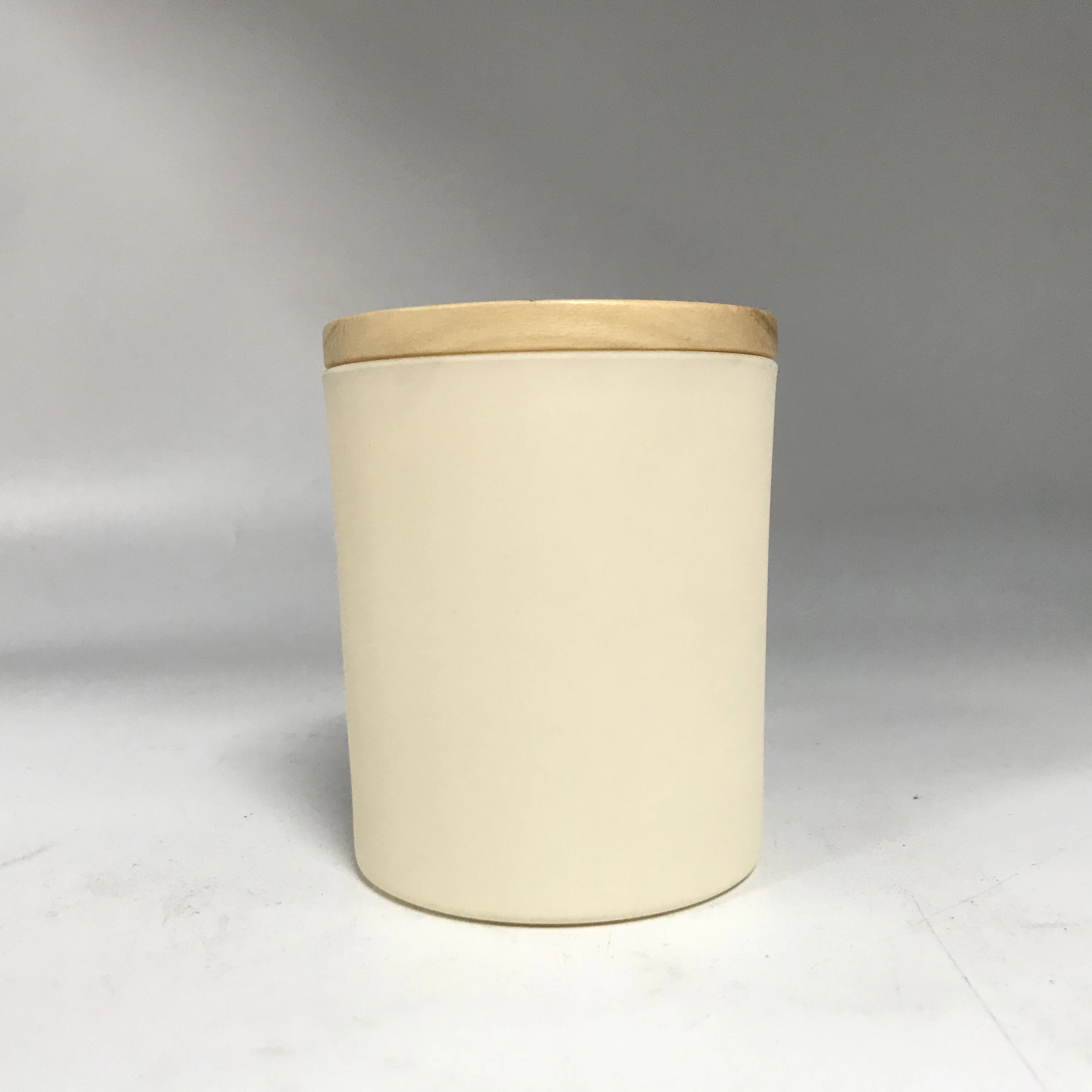 off-white glass candle jars with wood lid