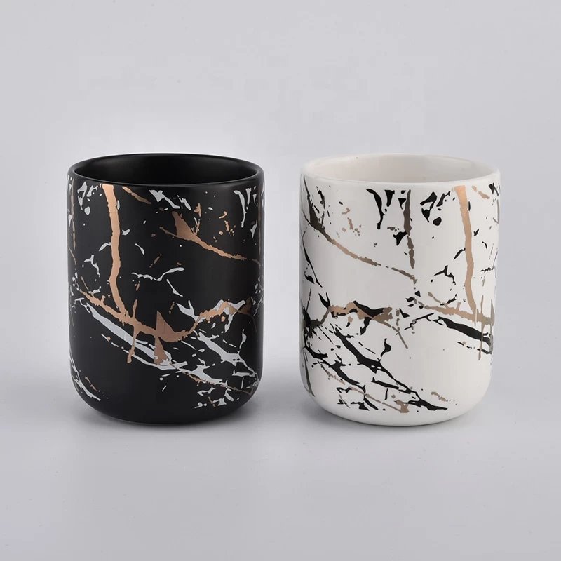 matt white ceramic candle jars with artwork