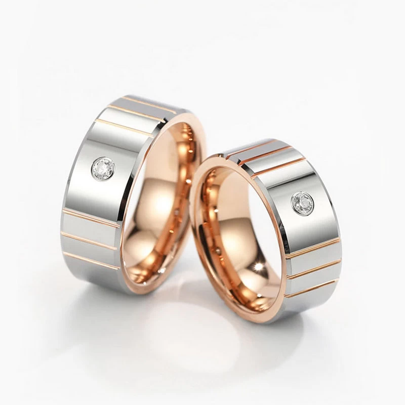 Chine Bandes de mariage populaires pour hommes rainurées de 8 mm, or rose poli et argent, bords plats et biseautés, bague en tungstène avec incrustation de pierres blanches CZ Fabricants