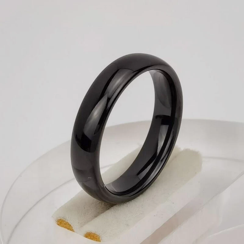 Chine Bague en tungstène en stock Bague en carbure de tungstène noir bombé populaire de 5 mm Bandes de mariage pour hommes Fabricants