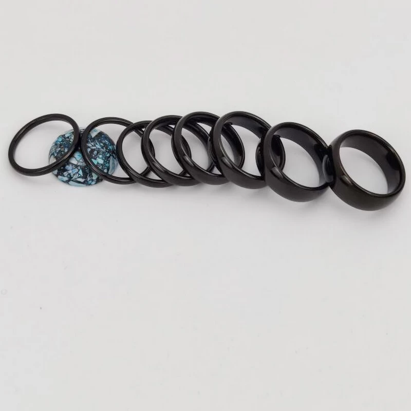 Chine Bague en tungstène en stock Bague en carbure de tungstène noir bombé populaire de 5 mm Bandes de mariage pour hommes Fabricants