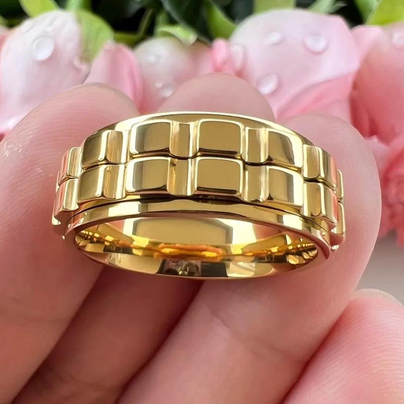 Design speciale, lavorazione eccellente, bordi piatti e gradini, anello girevole da uomo in tungsteno dorato, vestibilità comoda, produttore cinese