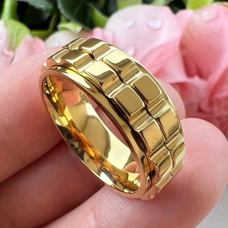 Design speciale, lavorazione eccellente, bordi piatti e gradini, anello girevole da uomo in tungsteno dorato, vestibilità comoda, produttore cinese