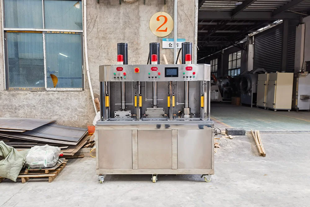 Cina 3 Stasiun Mesin Press Kue Teh/Bata Tekanan 30 Ton Dengan Debit Otomatis DL-6CY3-30Z pabrikan