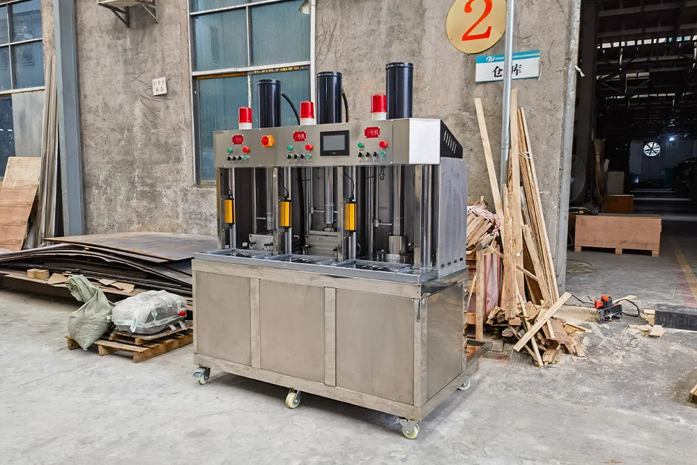 Cina 3 Stasiun Mesin Press Kue Teh/Bata Tekanan 30 Ton Dengan Debit Otomatis DL-6CY3-30Z pabrikan