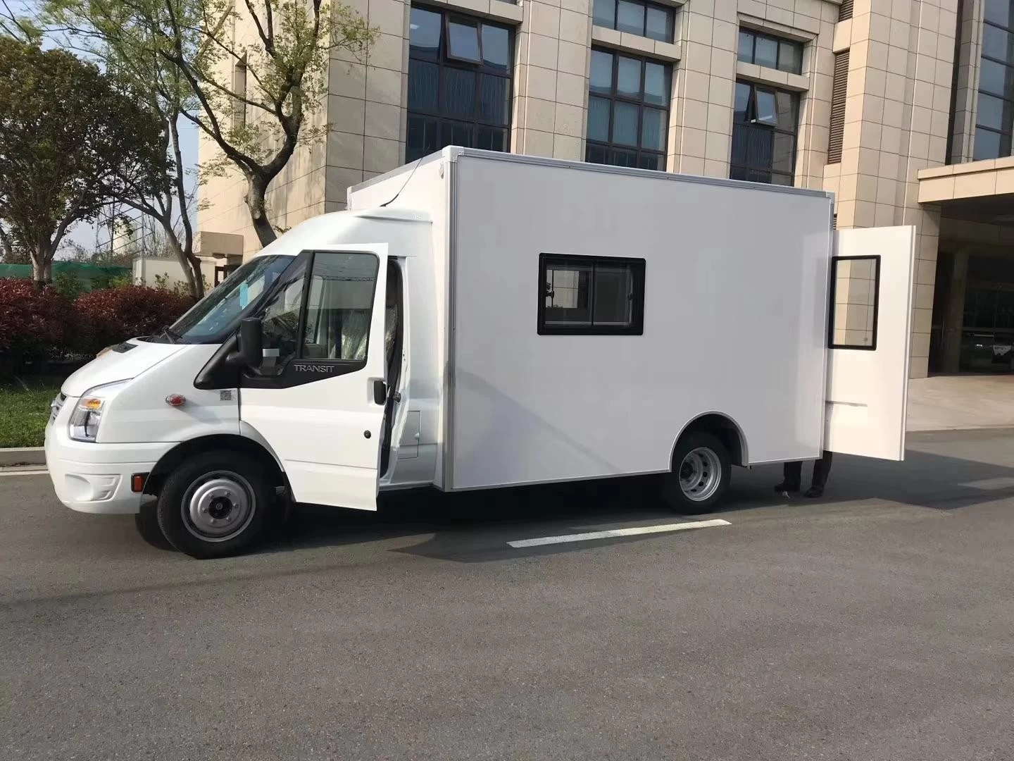 What materials are used to make the composite panels for RVs and refrigerated trucks?