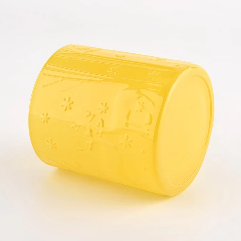 customized yellow colored glass candle jar with home decor