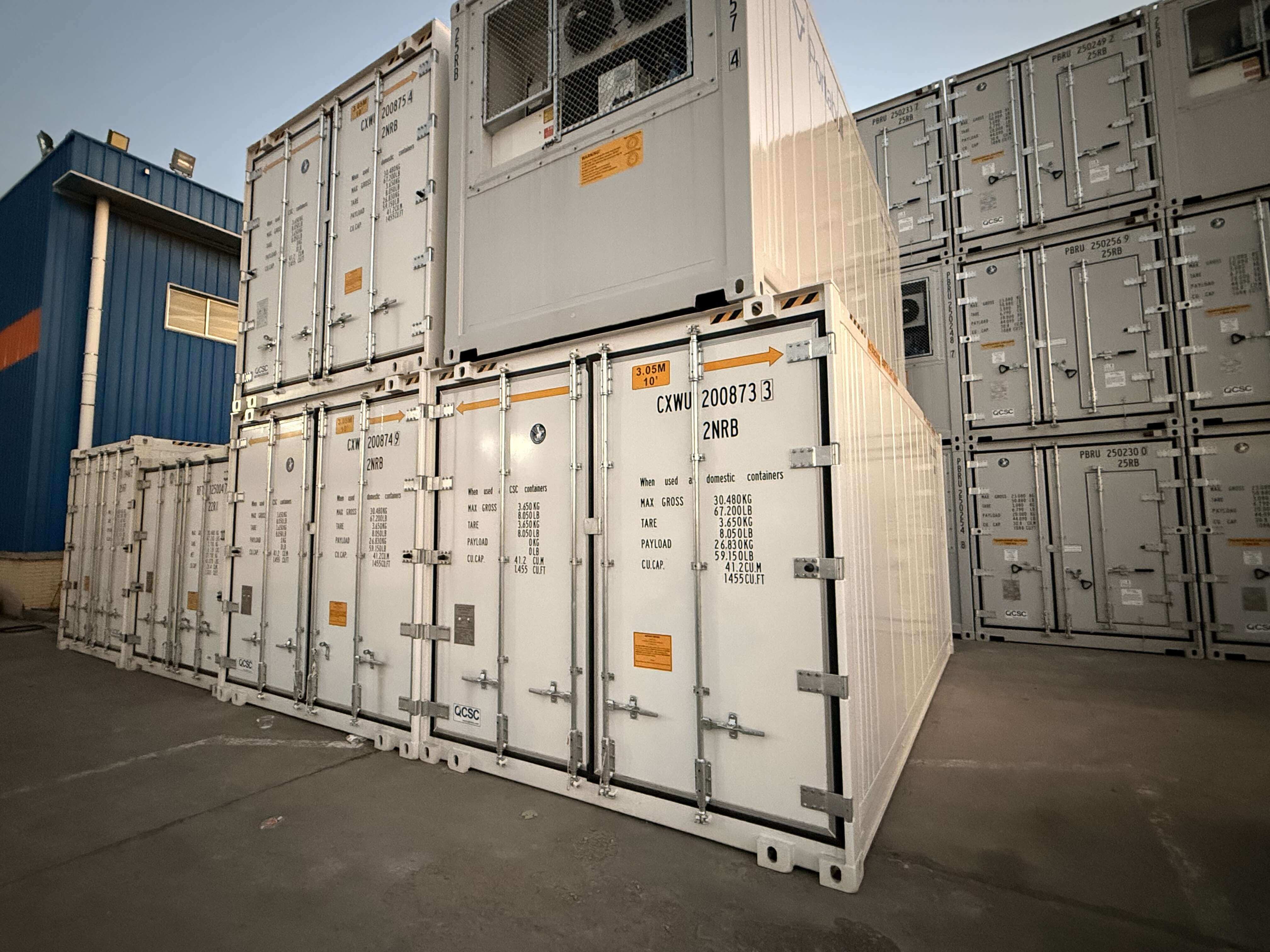Multiple ultra-wide reefer containers lined up at the facility showing proper arrangement