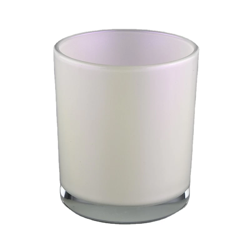 white iridescent candle holder with spraying color inside