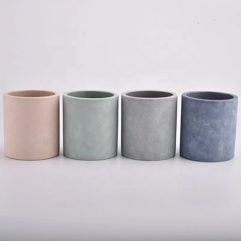 Grey concrete candle jars with different colors