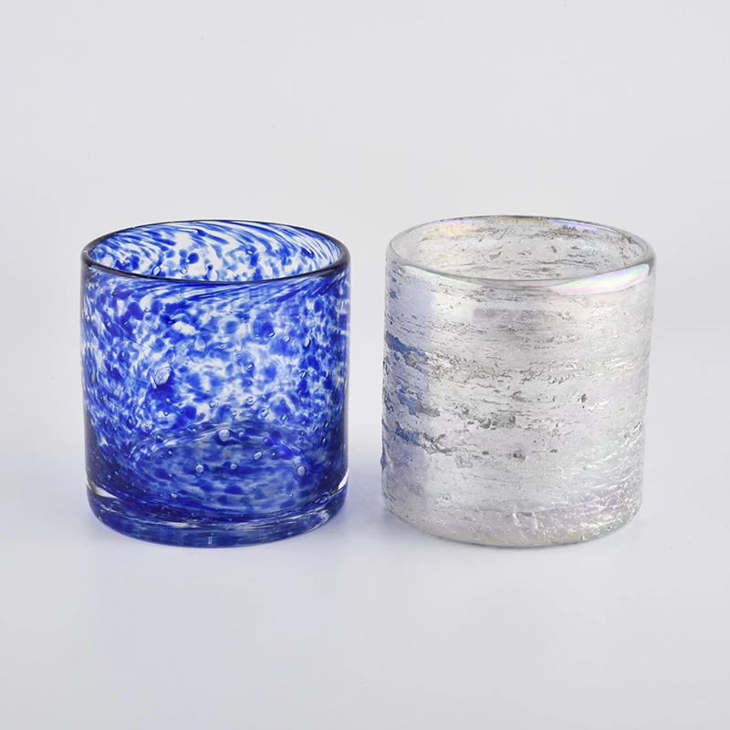Mouth blown glass candle vessels with colorful decoration