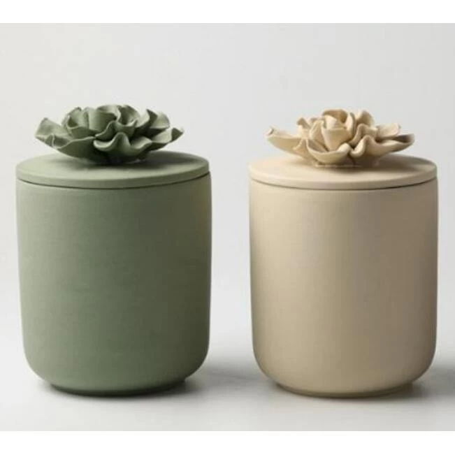 colored ceramic candle jar with flower lid