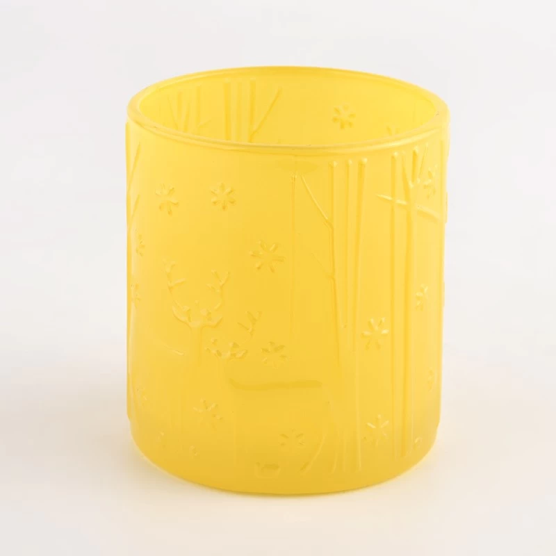 customized yellow colored glass candle jar with home decor