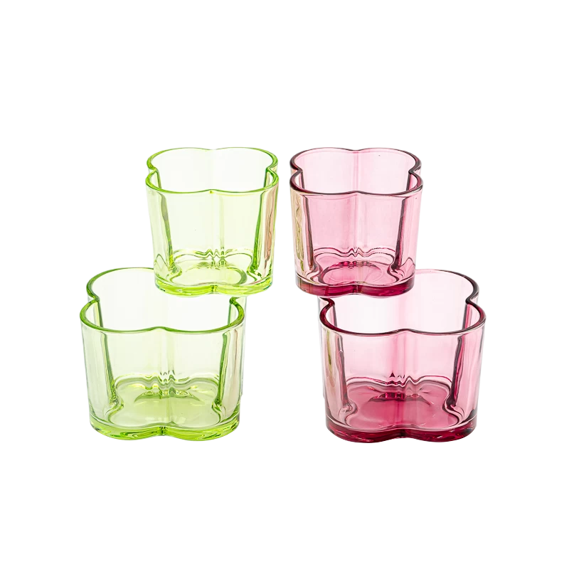 Popular green color glass candle vessel with flower design