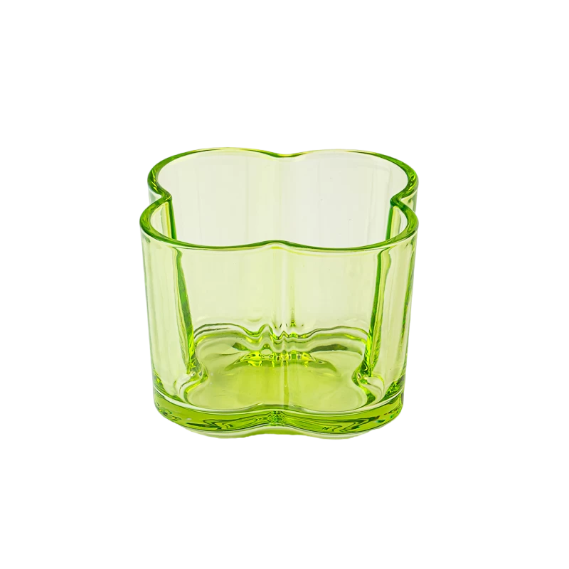 Popular green color glass candle vessel with flower design
