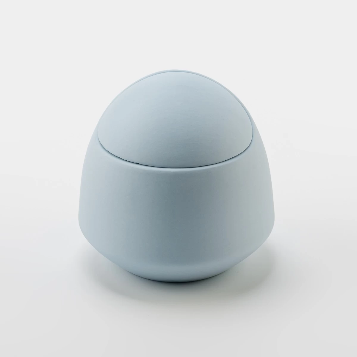 Egg shape ceramic candle jar with home decor