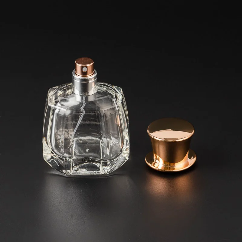 Wholesale Luxury 50ml Glass Empty Perfume Fragrance Glass Bottle with Champagne Gold Cap
