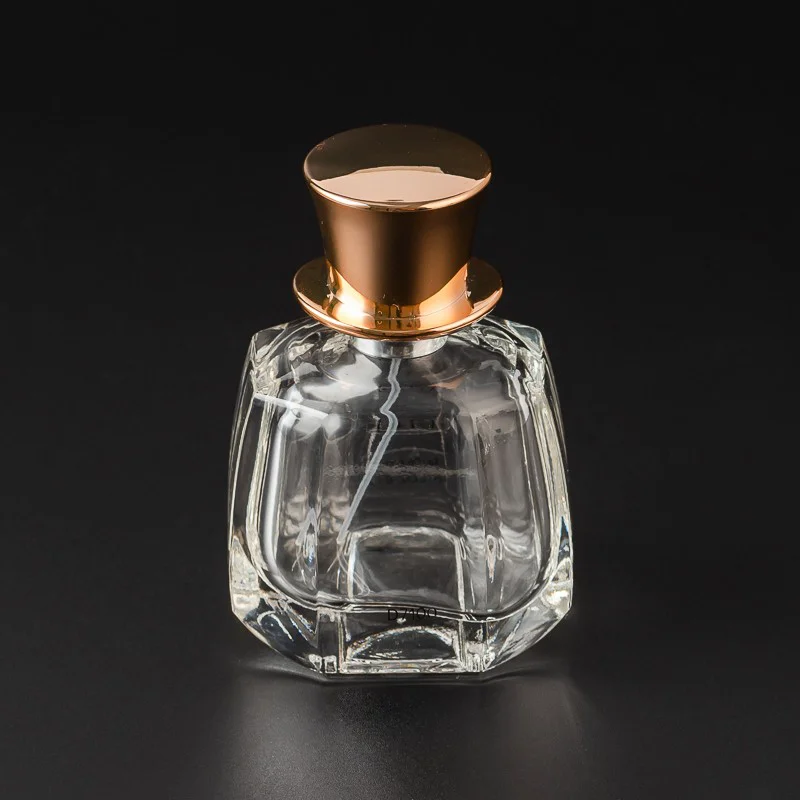 Wholesale Luxury 50ml Glass Empty Perfume Fragrance Glass Bottle with Champagne Gold Cap
