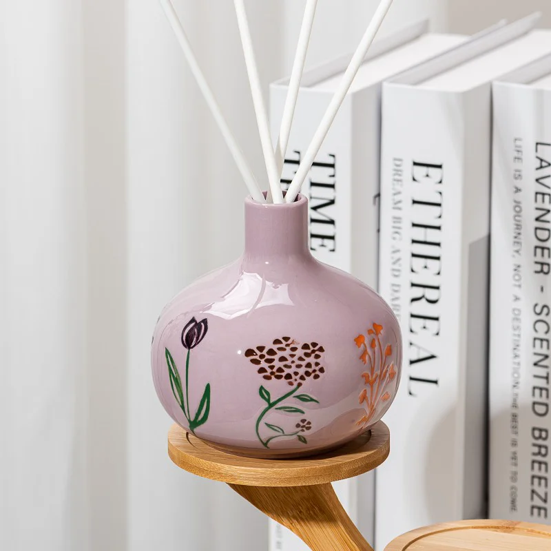 Wholesaling Fancy Pattern Pink Glazed Aroma Ceramic Bottle for Fragrance