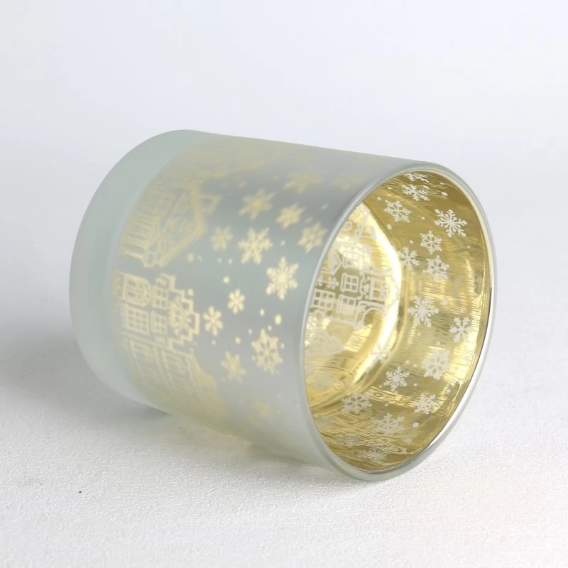 China electroplated laser hollow pattern frosted golden glass candle jar manufacturer