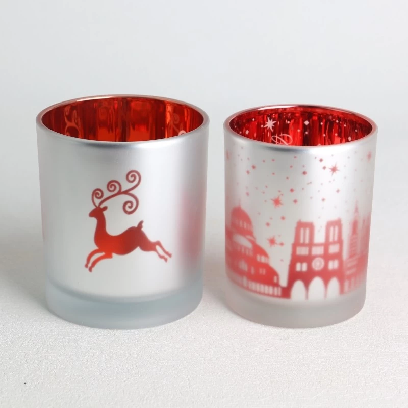 porcelana Tarro de vela de vidrio rojo verdadero esmerilado con patrón hueco láser galvanizado fabricante