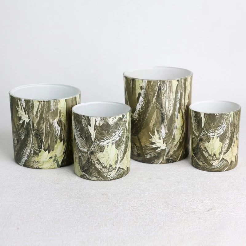 porcelana Tarro de vela de vidrio con patrón de camuflaje terminado con transferencia de agua fabricante
