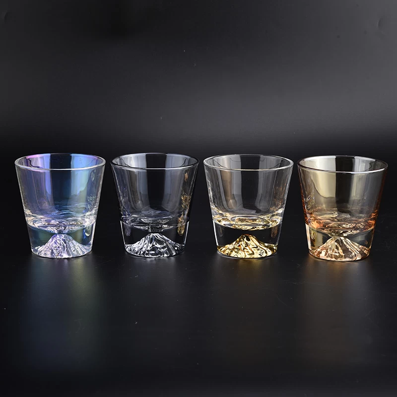 irridescent V shaped glass candle jars with mountain design