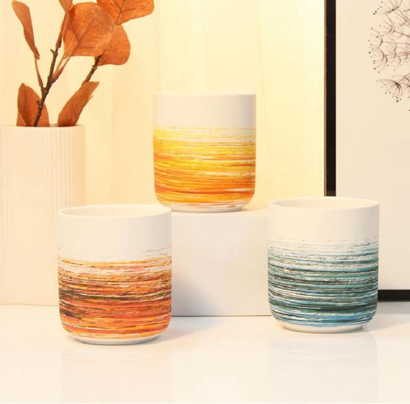 luxury matte ceramic candle vessels with hand painting
