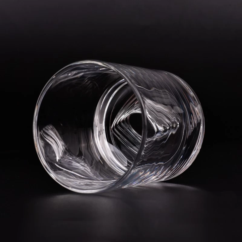 clear glass candle jar with round stripe pattern