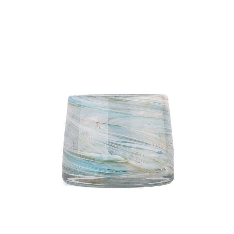 iridescent glass candle jars with coloring material 